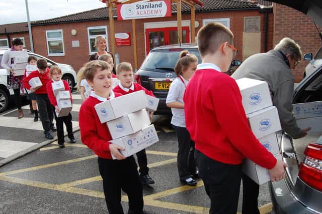 Pupils lend a hand to the Rotary Club of Boston St Botolph's shoebox appeal.