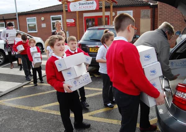 Pupils lend a hand to the Rotary Club of Boston St Botolph's shoebox appeal.