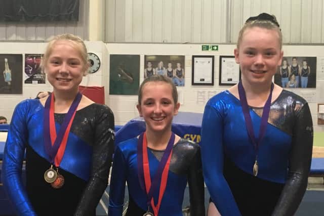 The over 11 Club 1 team gold medal winners Amy, Maddie, Evie EMN-171116-164009002