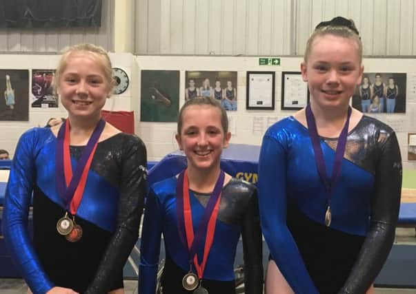 The over 11 Club 1 team gold medal winners Amy, Maddie, Evie EMN-171116-164009002