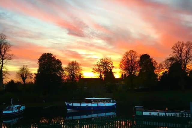 This sunset photograph, featuring the Boston Belle at its mooring, was taken by Mike Crowe, and is an entry for November.