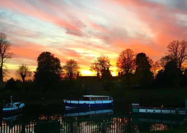 This sunset photograph, featuring the Boston Belle at its mooring, was taken by Mike Crowe, and is an entry for November.
