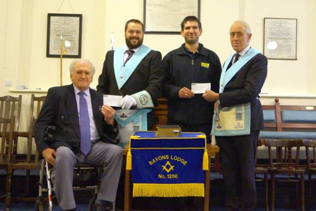 Worshipful Master of Bayons Lodge, Nathan Barnes, eft, and charity steward Edward Backus presented £750 to Mick Harper, chairman of the Lincolnshire Branch of the British Polio fellowship, and Richard Spence of LIVES EMN-171120-091227001