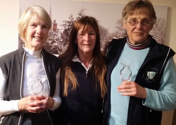 Lady captain Pam Hayden is flanked by winners Janet Ablott (left) and Peggy Hales EMN-171120-104655002