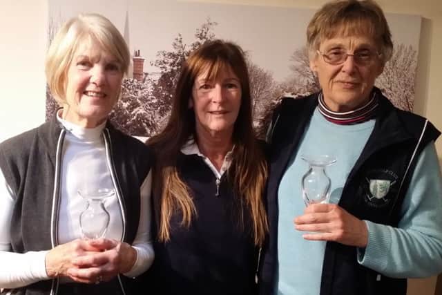 Lady captain Pam Hayden is flanked by winners Janet Ablott (left) and Peggy Hales EMN-171120-104655002