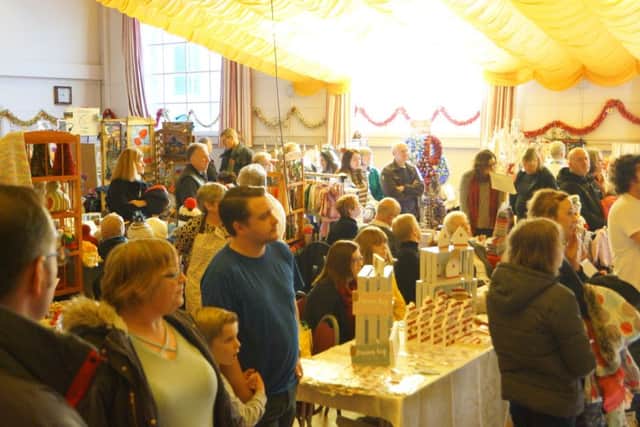 The crowded Caistor Lions Victorian Christmas Market EMN-171120-152742001