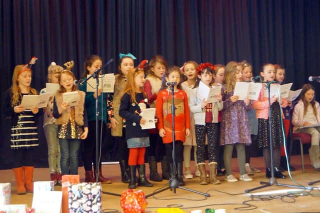 Some of the singers from the primary school who delighted the crowd EMN-171120-152908001