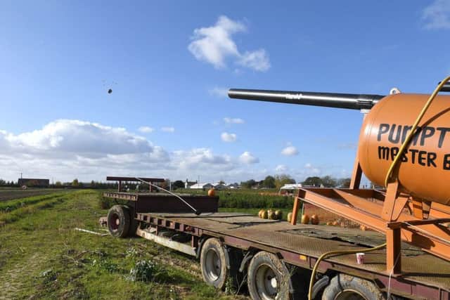 The pumpkin cannon in action.